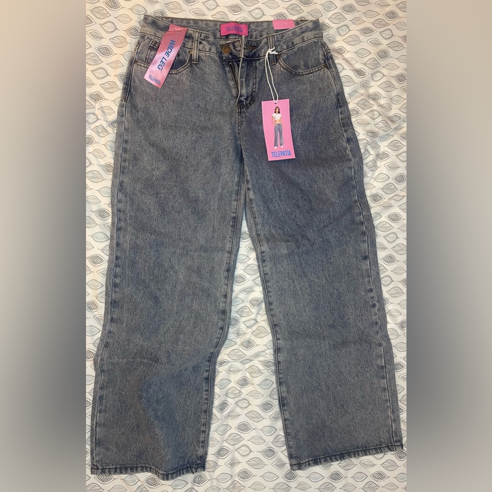 Telepatia jeans. Blue with pink embroidered bows. Wide leg. Size 7
